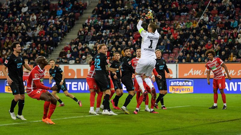 Augsburg edges Hoffenheim to move clear of drop zone