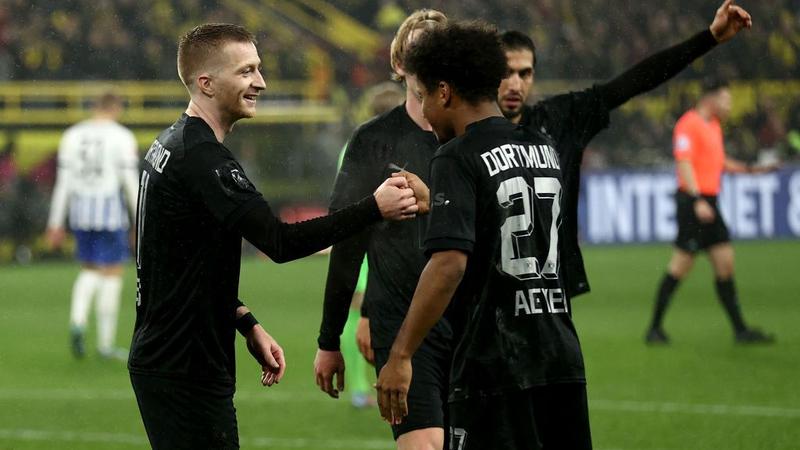 Dortmund keeps heat on Bayern with big win over Hertha