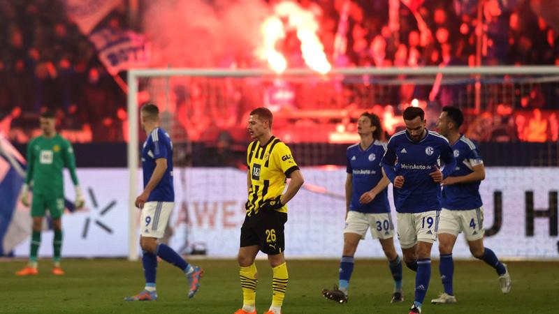 Bayern alone on top after Dortmund drop points in derby
