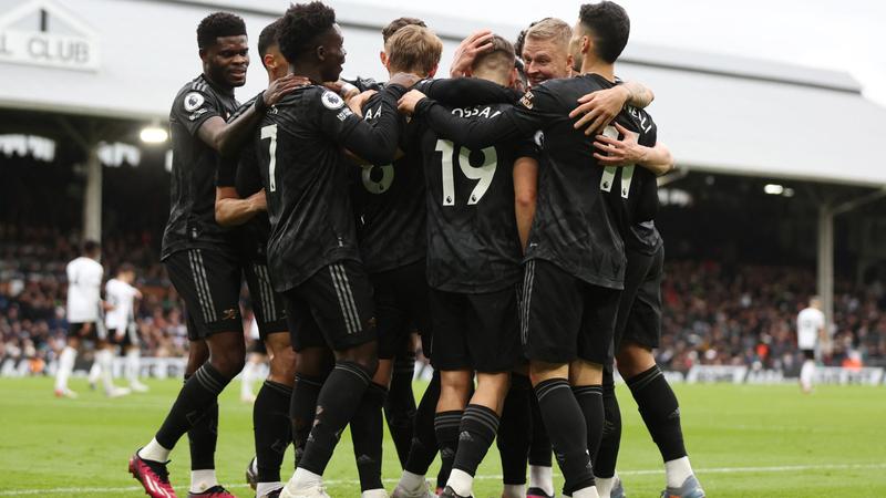 Arsenal regain five-point lead with Fulham stroll
